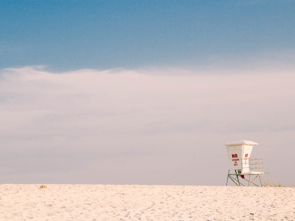 White Lifeguard Station On Beach Art Print